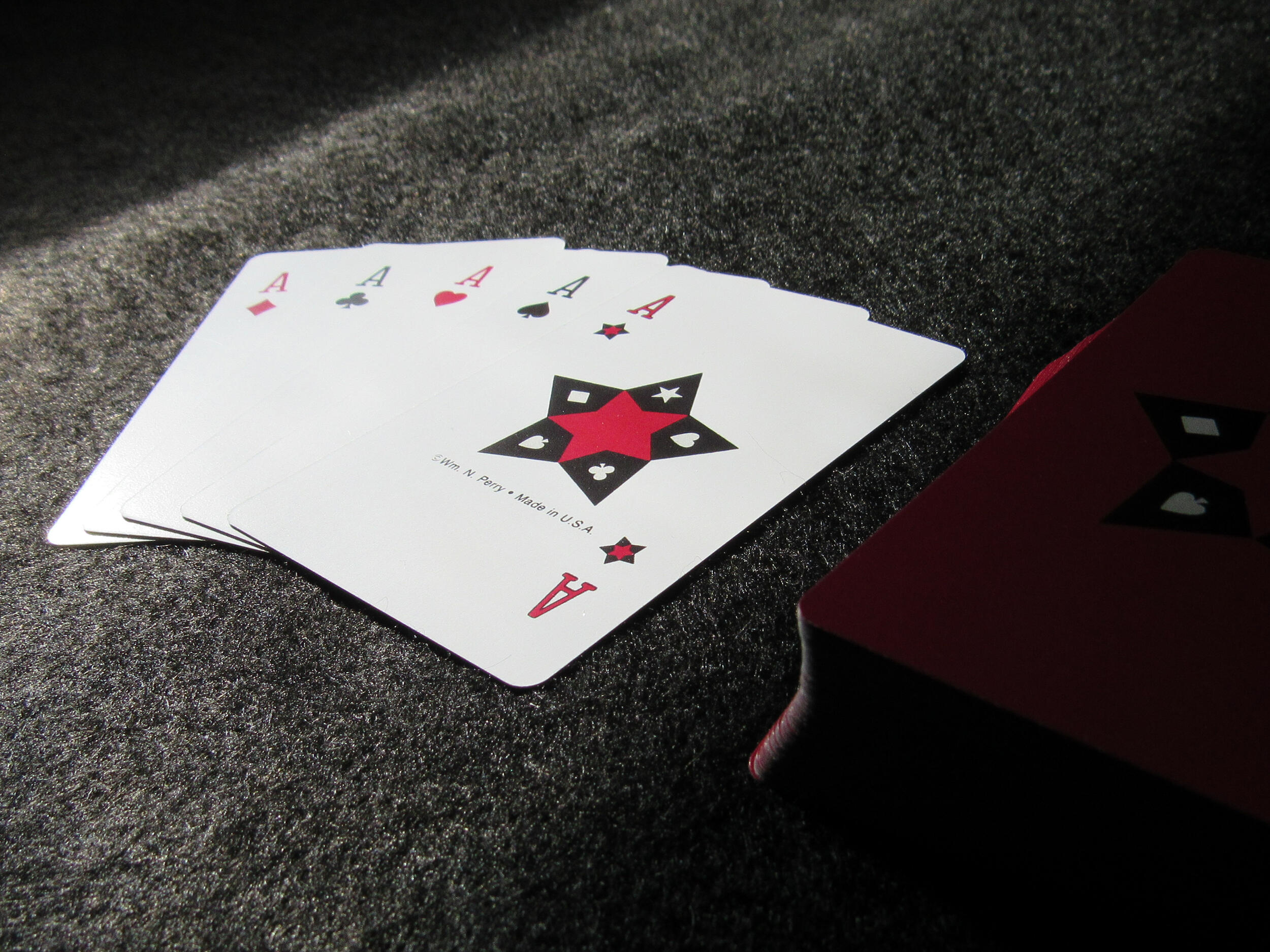 Stardeck 5-Suited Playing Cards showing 5-of-a-Kind with Aces